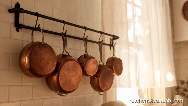 Copper pots with natural patina after cleaning with ketchup and salt